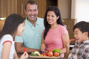 family preparing food together