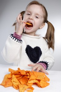 girl eating doritos