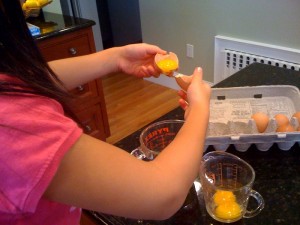 Lilah separating eggs