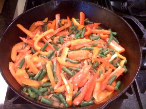 bell pepper and green beans in skillet